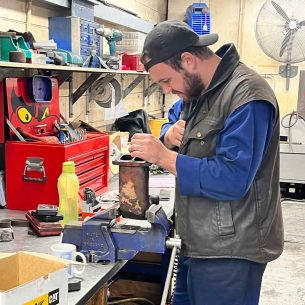 Ben-Turton-assessing-a-manifold-repair